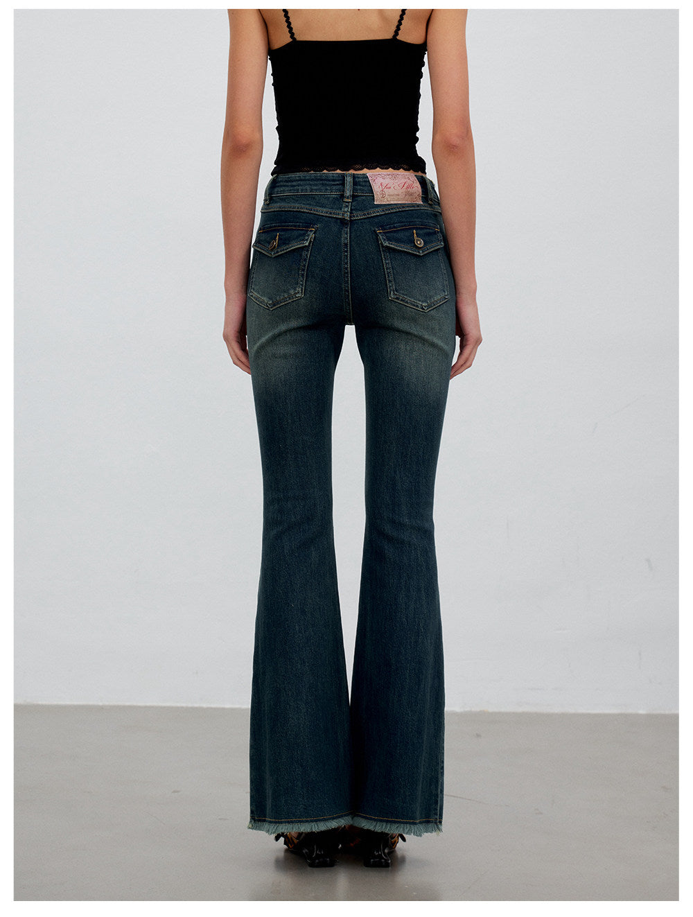 Washed Raw-Edge Belted Flare Jeans