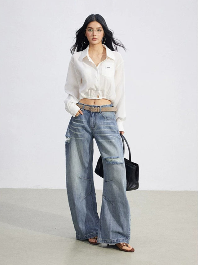 Distressed Curved Wide-Leg Jeans