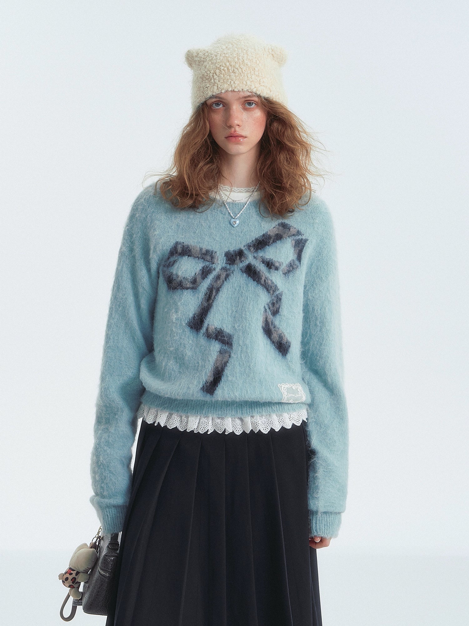 Leopard Bow Crewneck Sweater