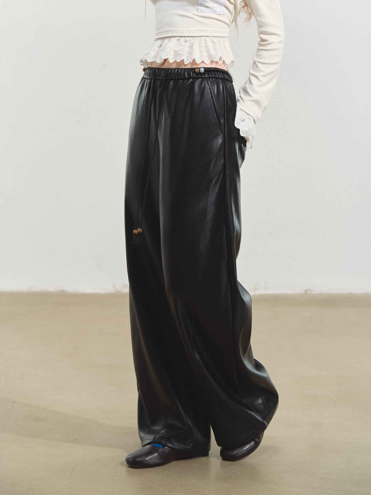 Relaxed Curve-Cut PU Pants