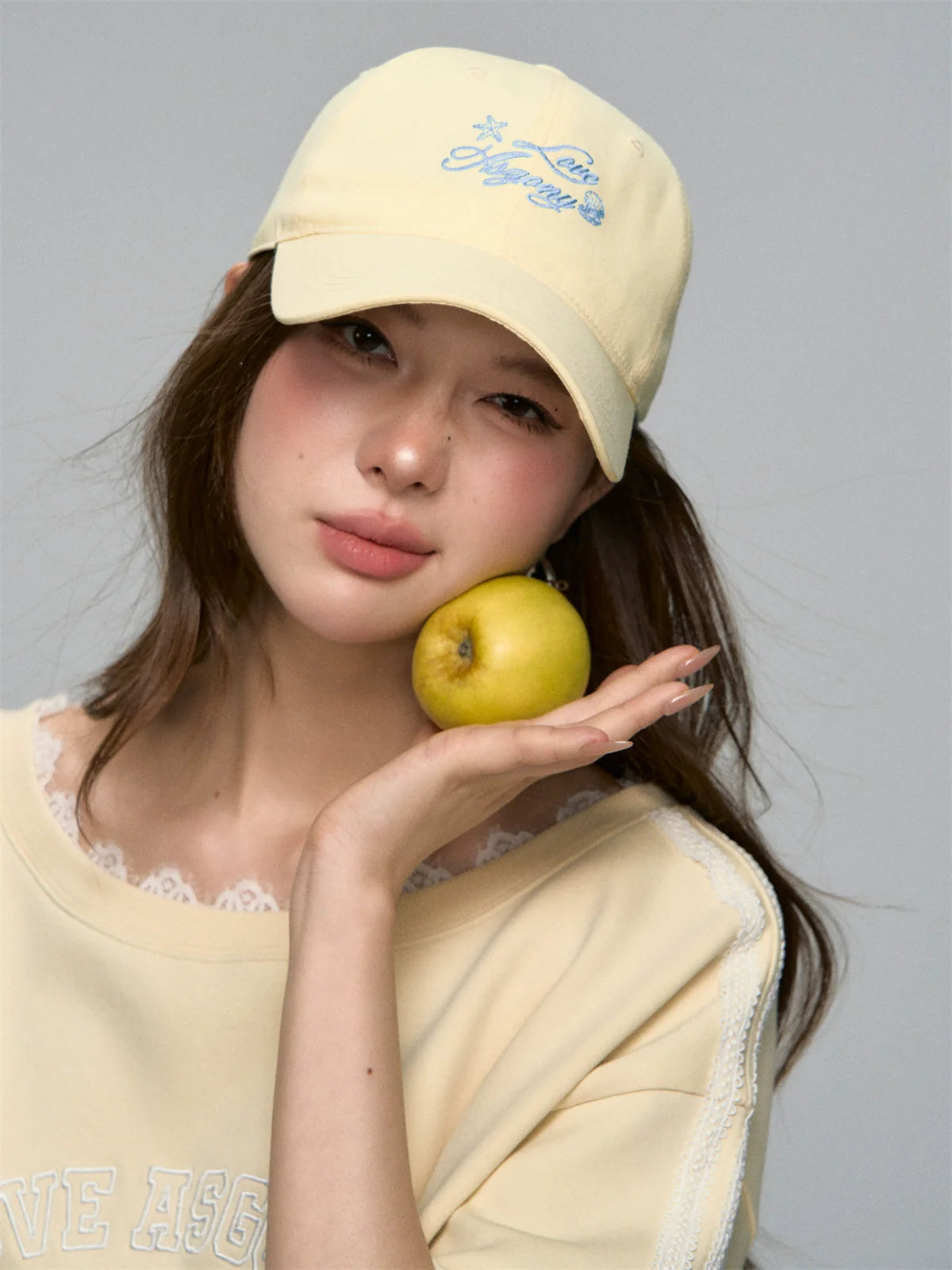 Cream-colored Embroidered Visor Cap