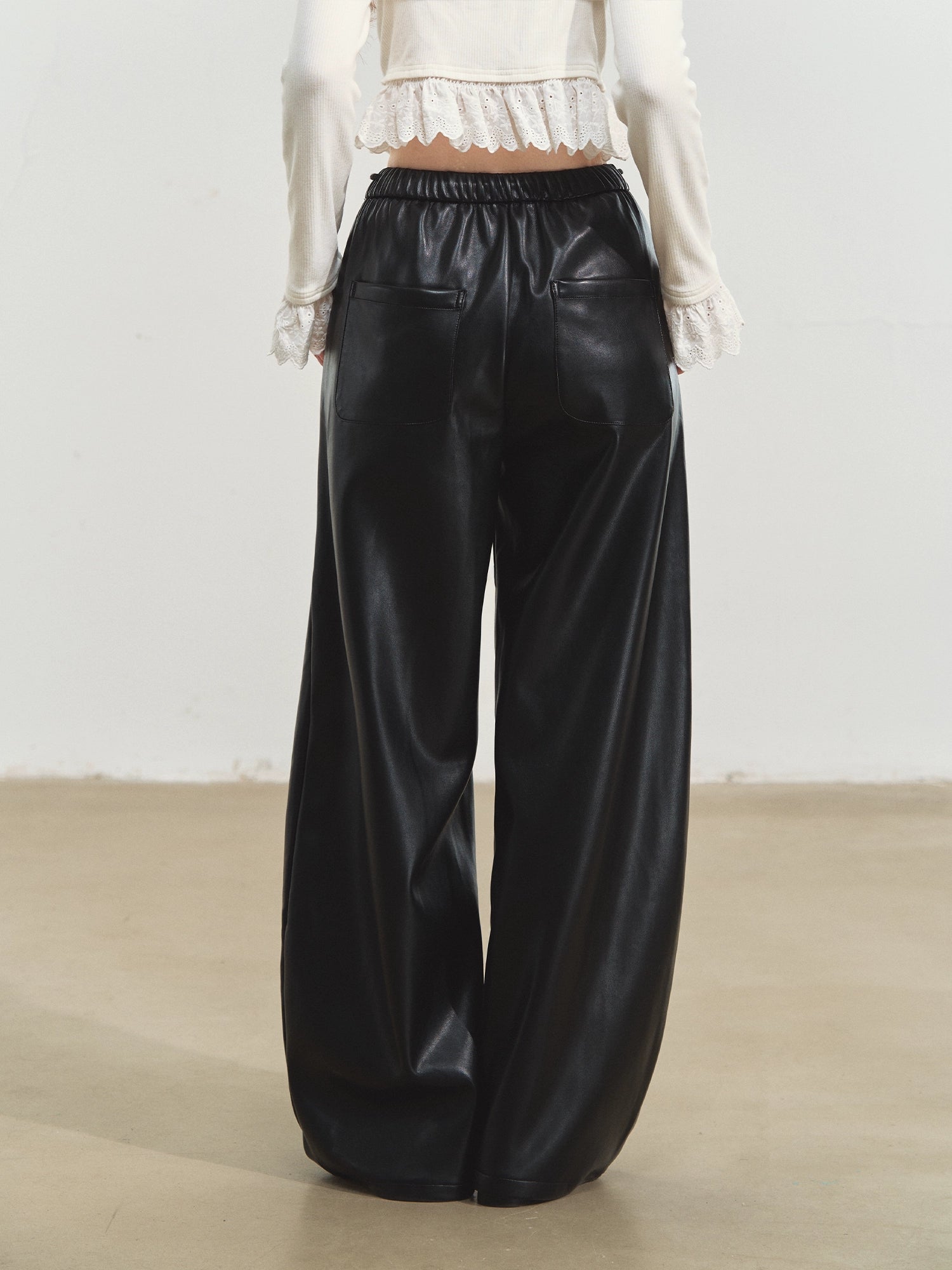 Relaxed Curve-Cut PU Pants