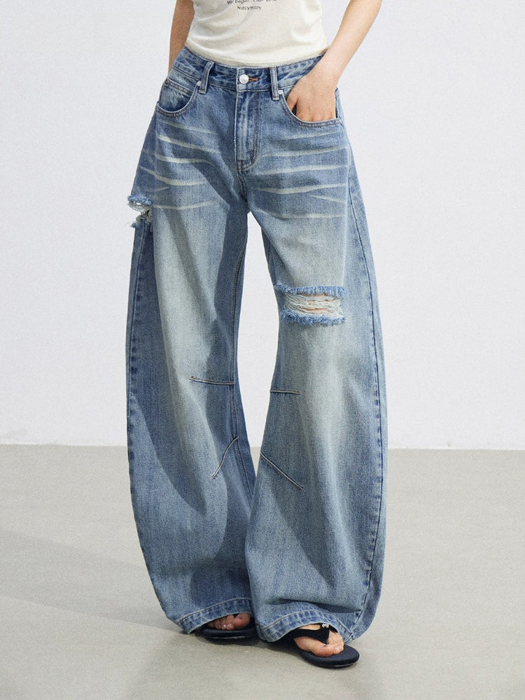 Distressed Curved Wide-Leg Jeans