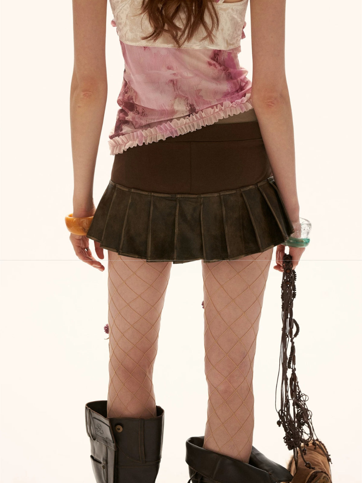 Distressed Low-Rise Pleated Mini Skirt