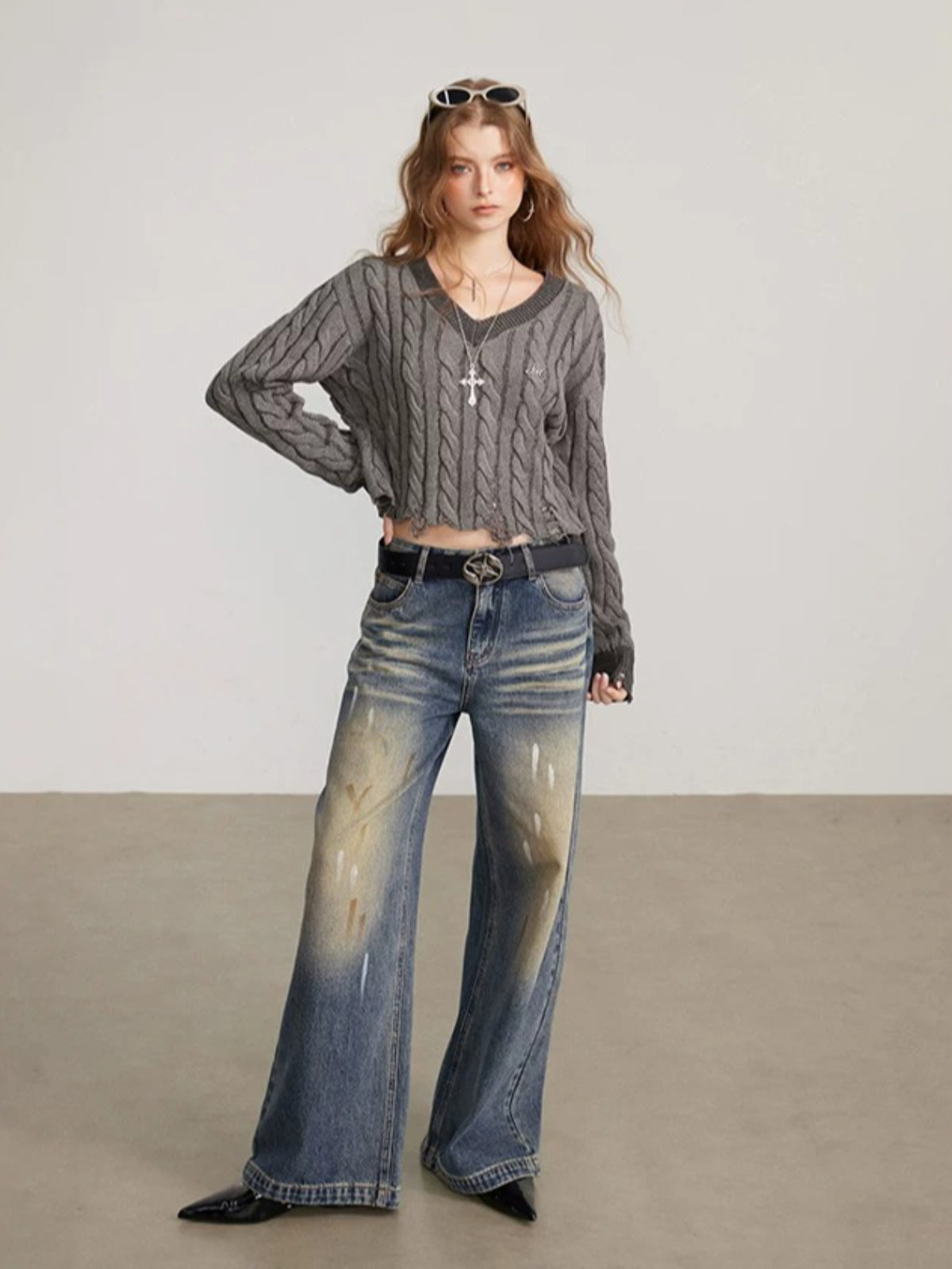 Distressed Cable Knit V Neck Sweater