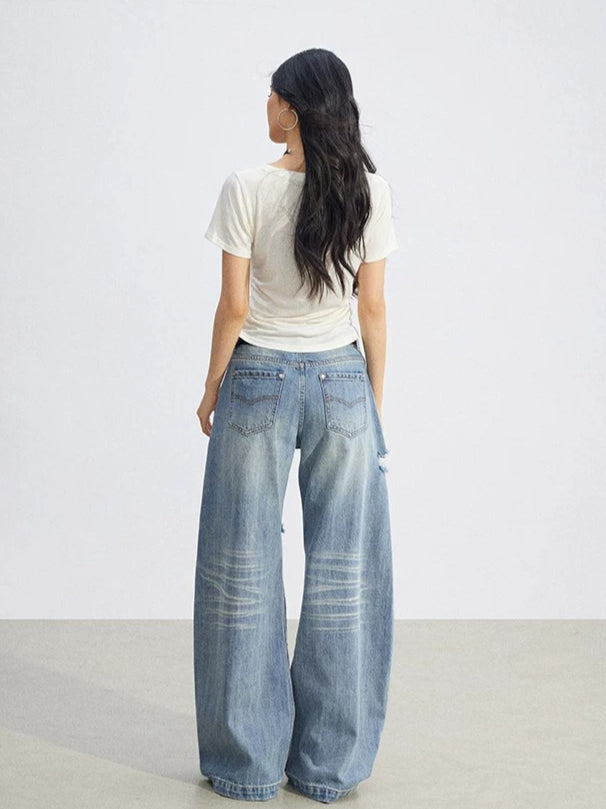 Distressed Curved Wide-Leg Jeans