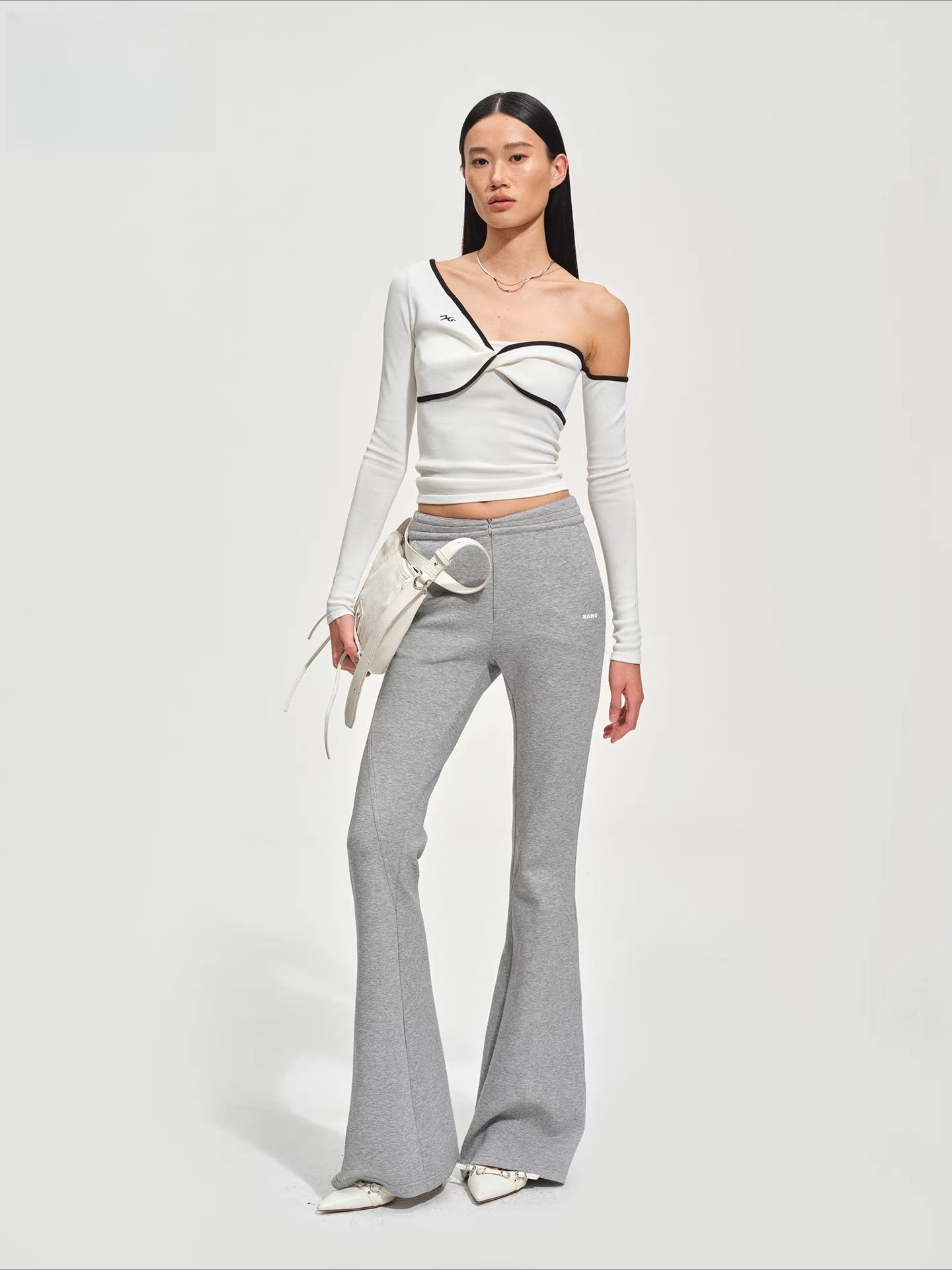 Sculptural Twist Asymmetric Knit Top