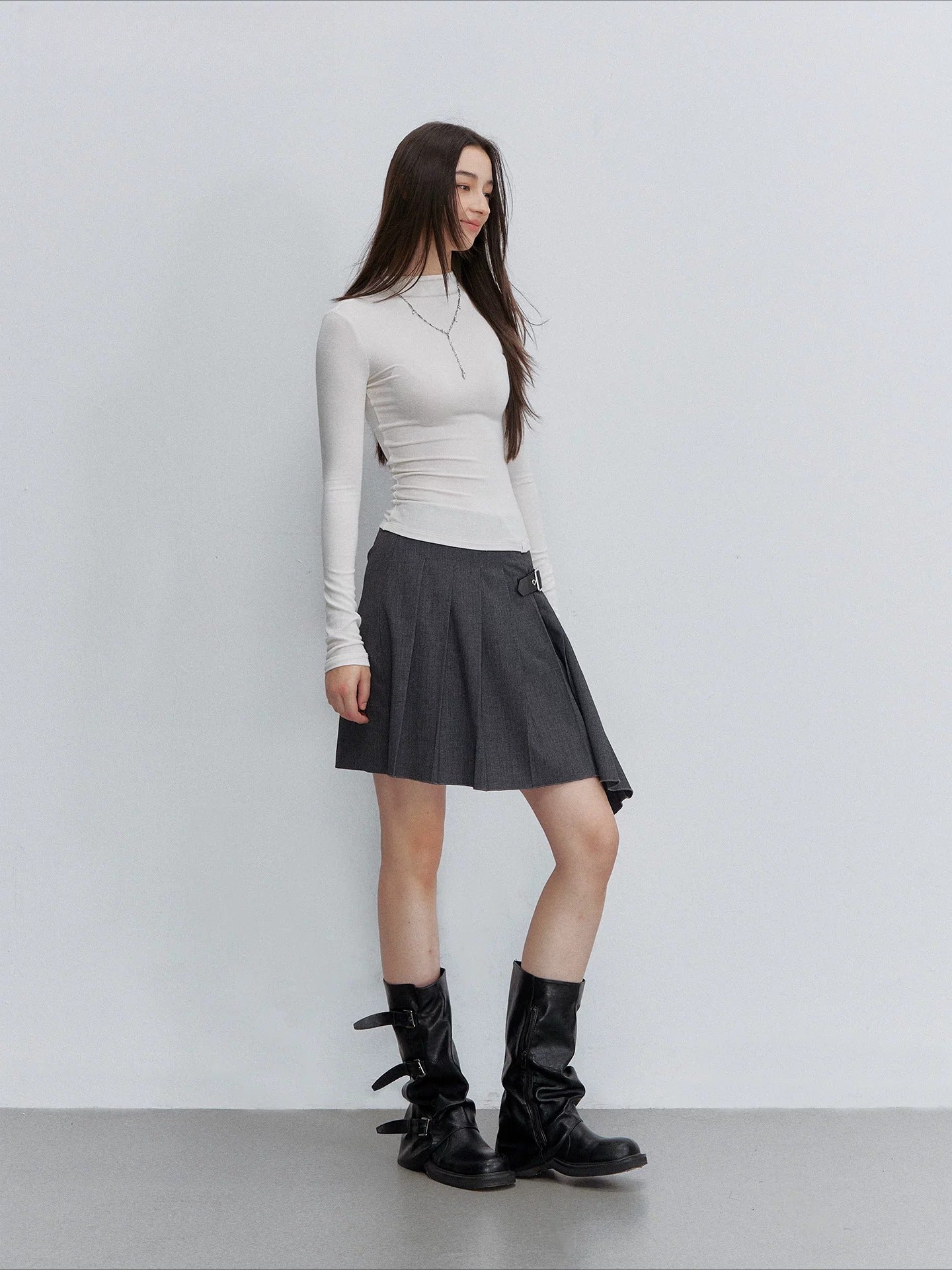 Pleated Buckle Mini Skirt