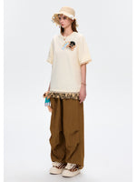 Surfing Doll Cotton T-shirt