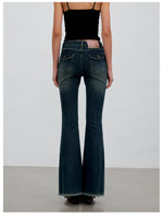 Washed Raw-Edge Belted Flare Jeans