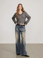 Distressed Cable Knit V Neck Sweater