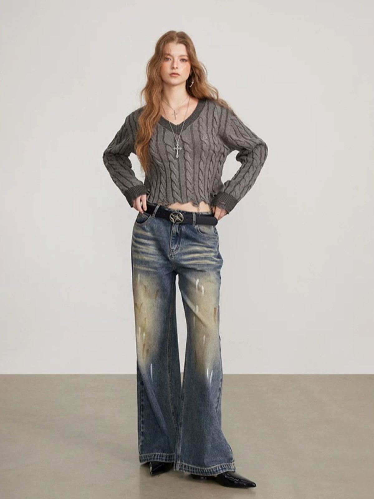 Distressed Cable Knit V Neck Sweater