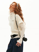 Textured Openwork Puff Sleeve Knit Top