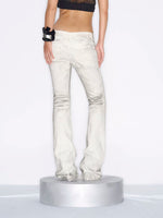 Distressed Low-Rise Flare Jeans