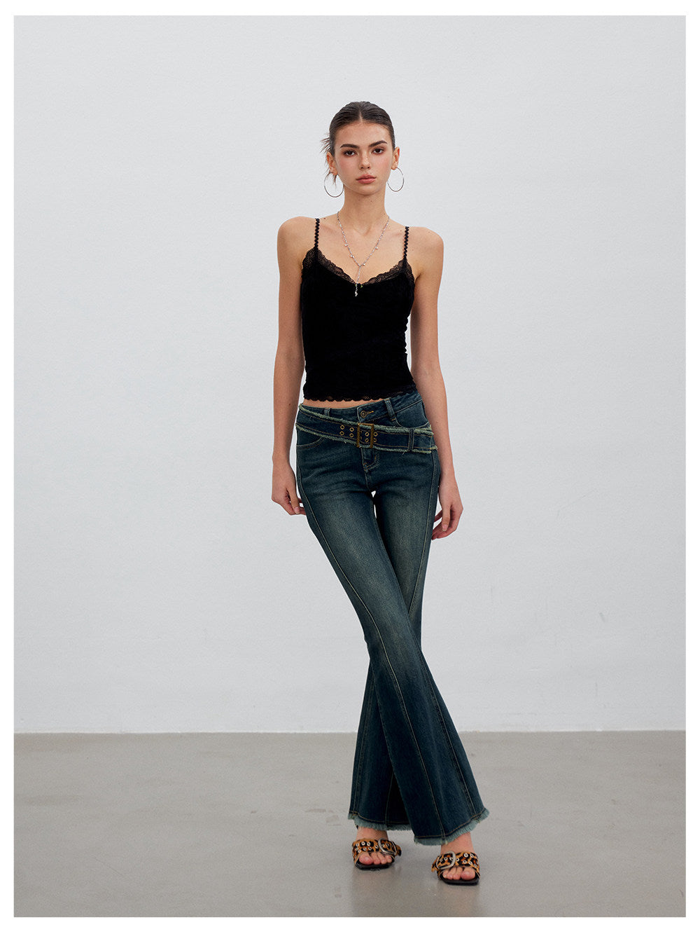 Washed Raw-Edge Belted Flare Jeans