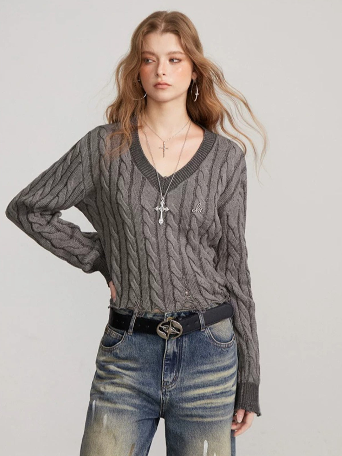 Distressed Cable Knit V Neck Sweater