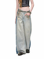 Distressed Curved Denim Pants