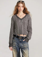 Distressed Cable Knit V Neck Sweater