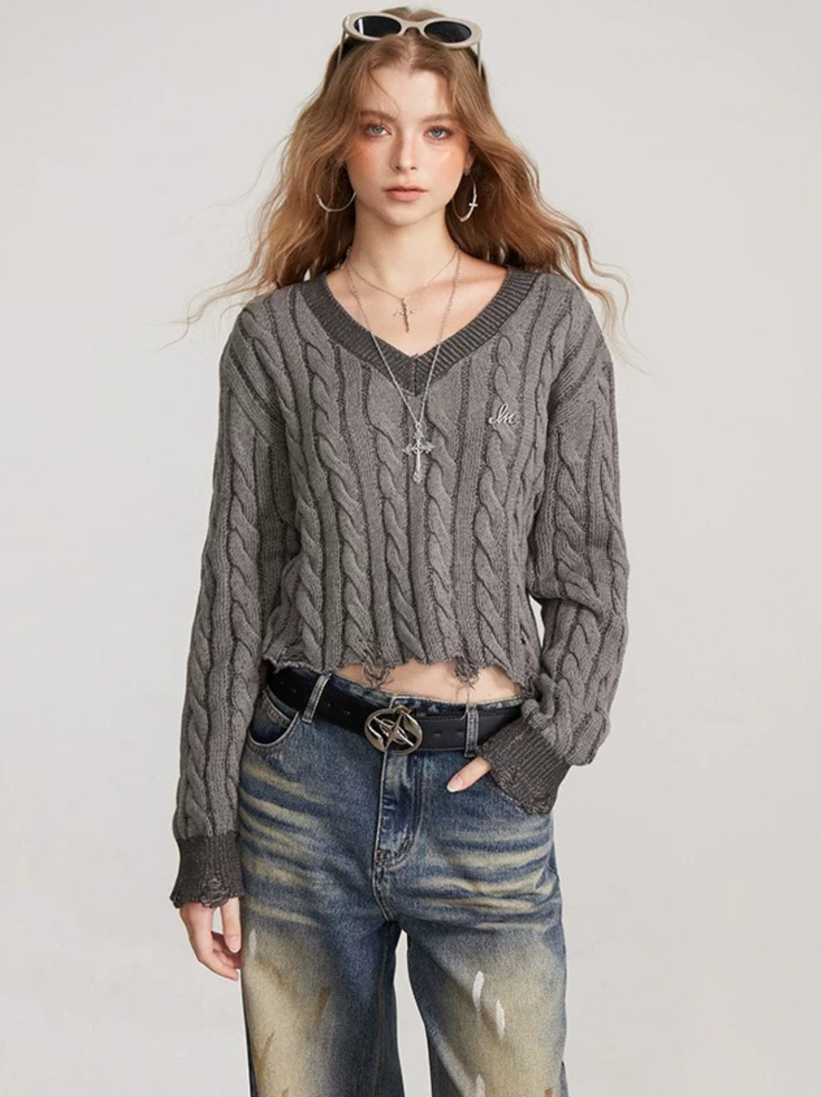 Distressed Cable Knit V Neck Sweater