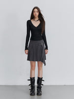 Pleated Buckle Mini Skirt