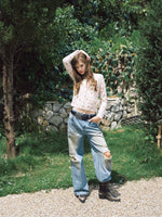 Distressed Low-Rise Wide-Leg Jeans