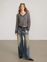 Distressed Cable Knit V Neck Sweater