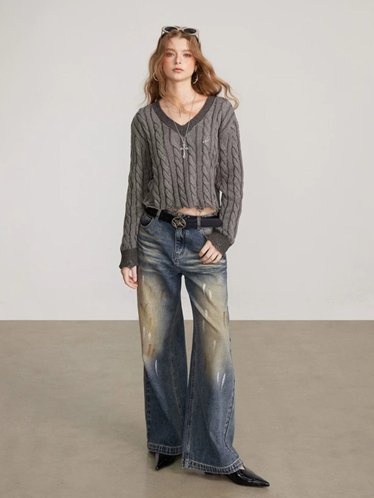 Distressed Cable Knit V Neck Sweater