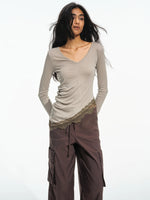 Asymmetric Lace Hem Long Sleeve Top