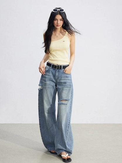 Distressed Curved Wide-Leg Jeans