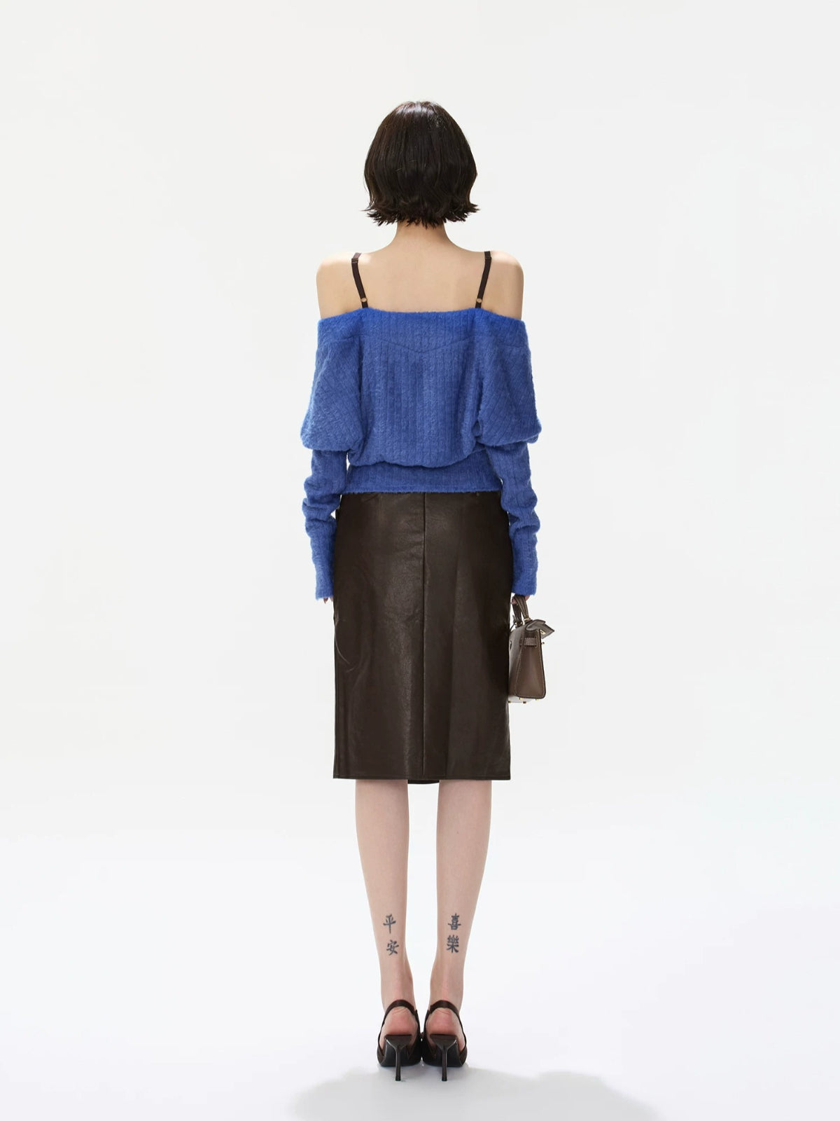 Amber Paneled Faux Leather Midi Skirt