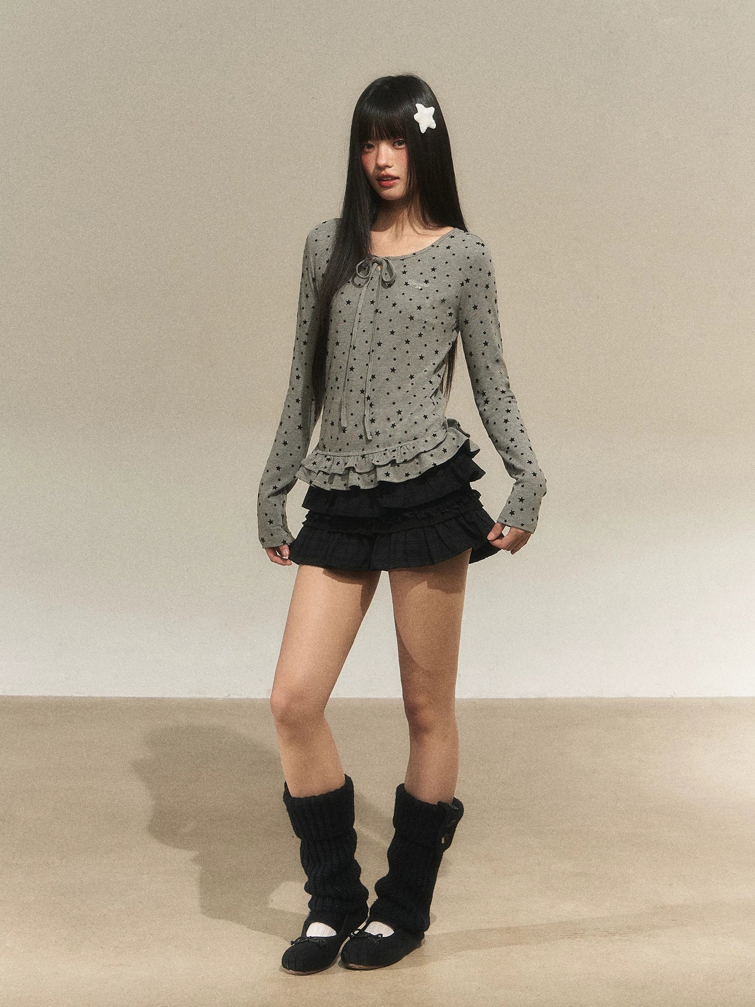 Star Ruffle Waist Knit Top