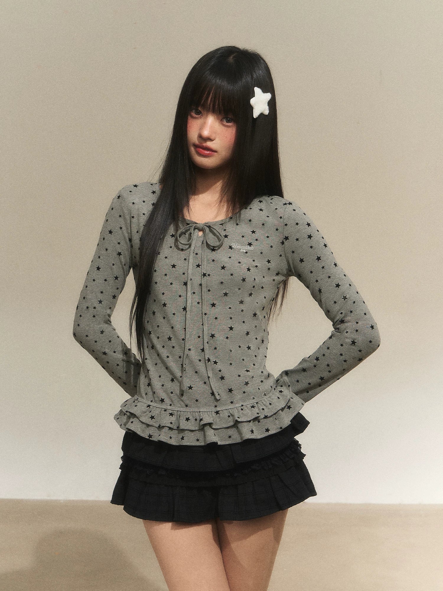 Star Ruffle Waist Knit Top