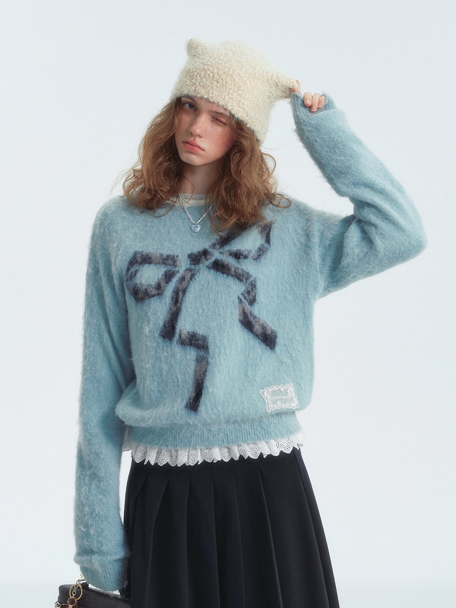 Leopard Bow Crewneck Sweater