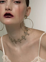 Baroque Wind Flashes Cross Choker