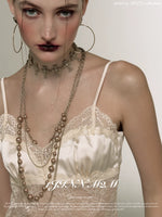 Baroque Wind Flashes Cross Choker