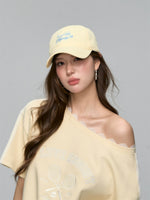 Cream-colored Embroidered Visor Cap