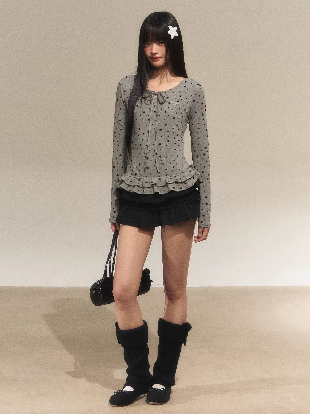 Star Ruffle Waist Knit Top