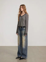 Distressed Cable Knit V Neck Sweater