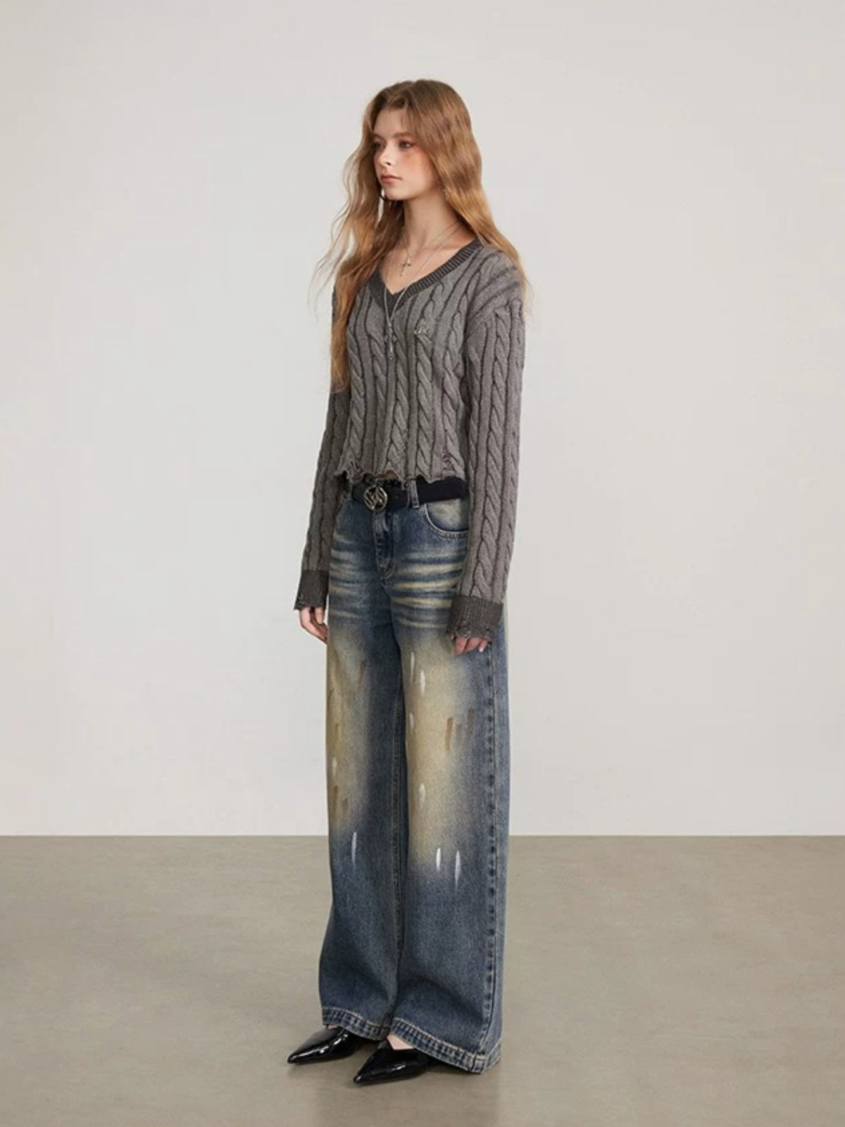 Distressed Cable Knit V Neck Sweater