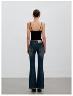 Washed Raw-Edge Belted Flare Jeans