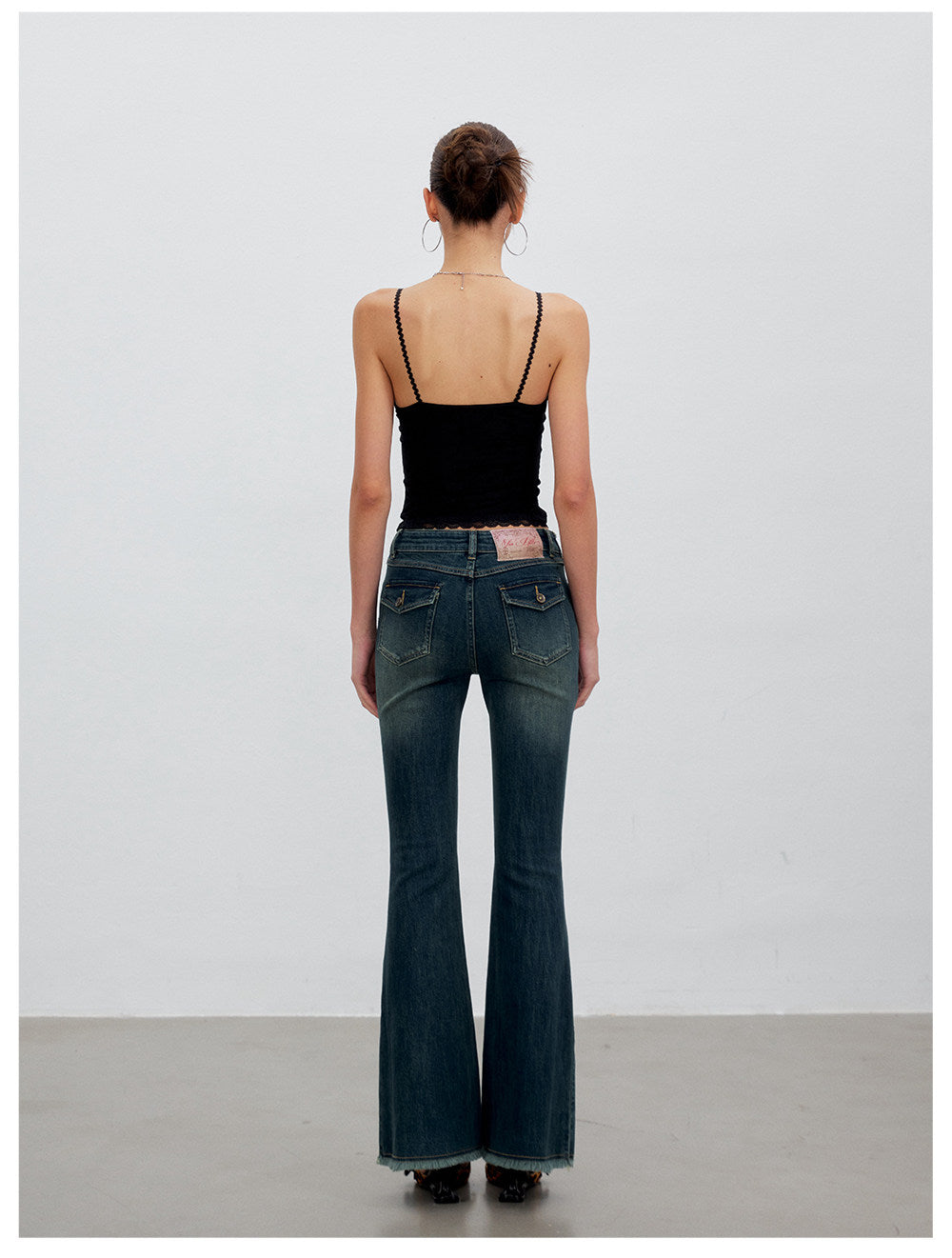Washed Raw-Edge Belted Flare Jeans
