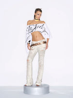 Distressed Low-Rise Flare Jeans