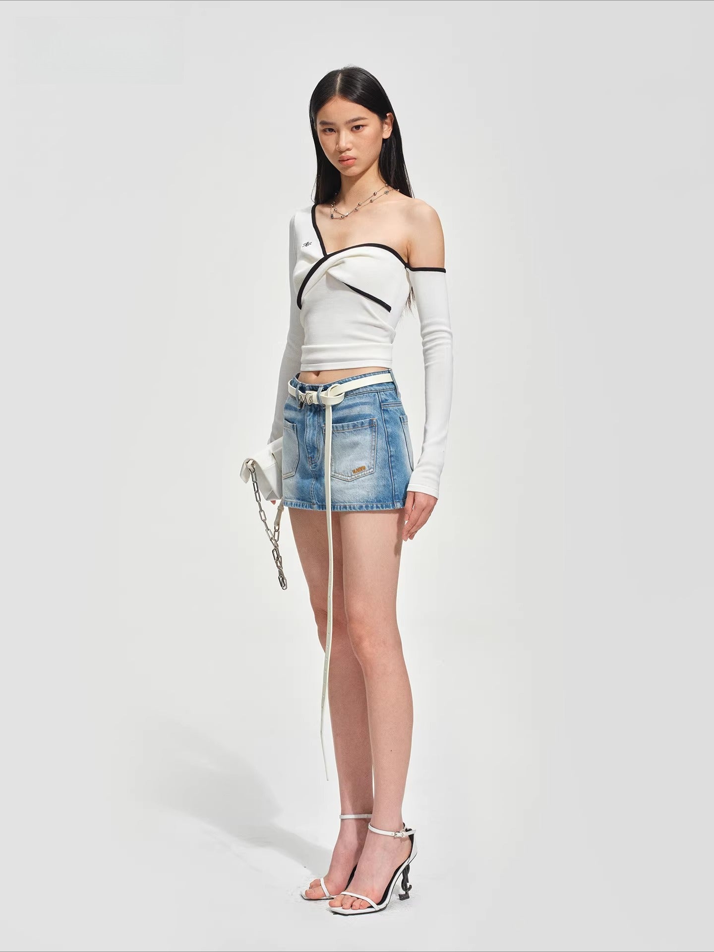 Sculptural Twist Asymmetric Knit Top